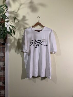 White OAMC Spray tee “Do you know where your children are”